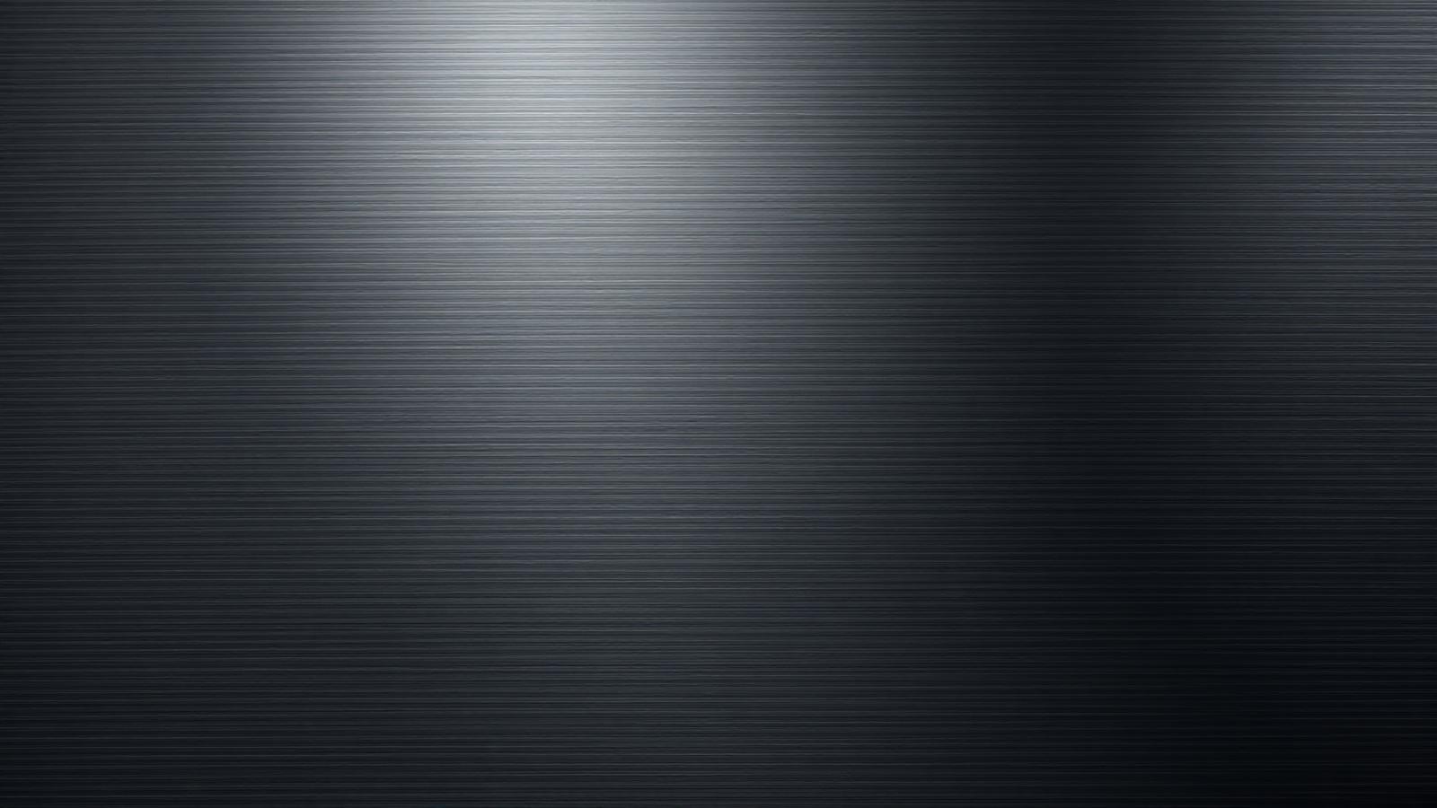 Brushed graphite and silver metal texture background